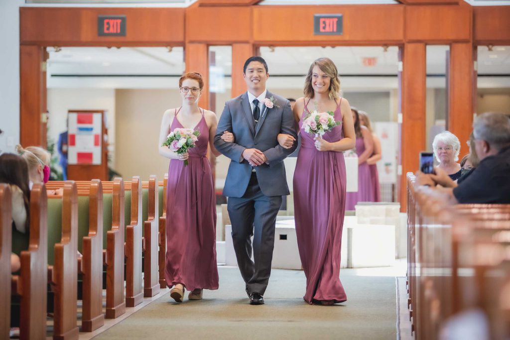A ceremony where a bride and groom walk down the aisle.