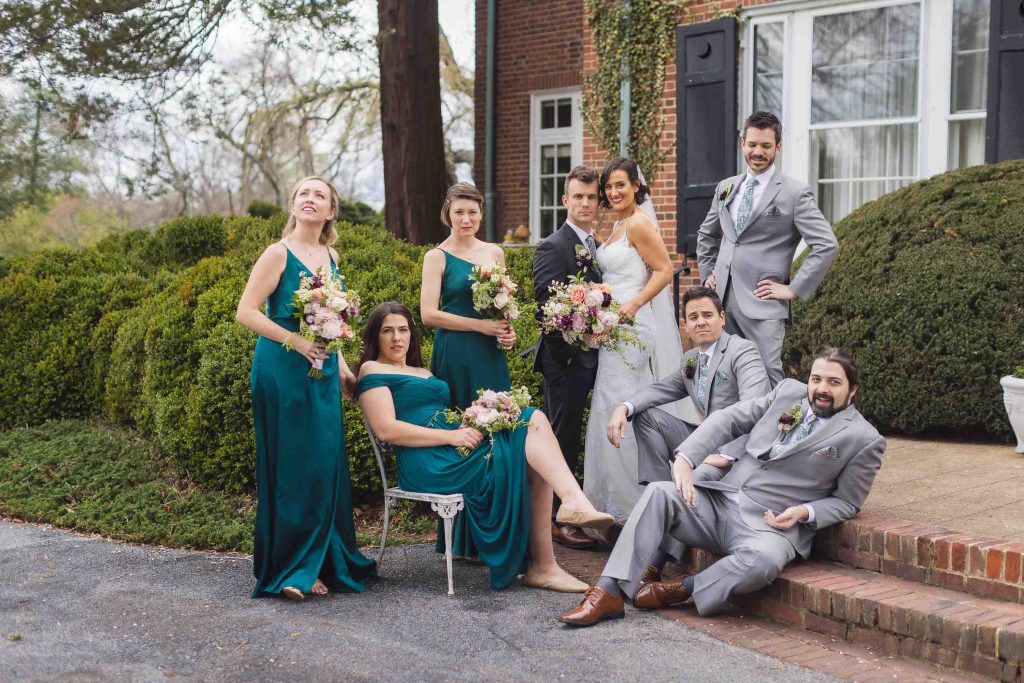 A wedding party posing for a portrait.