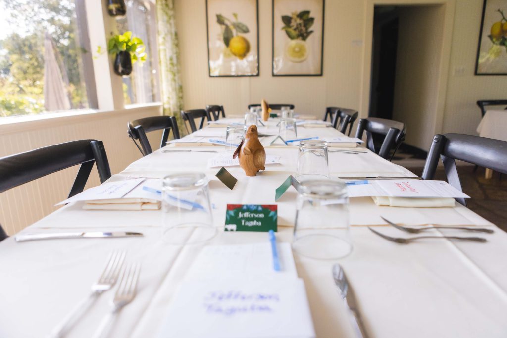 A table is set up with details for a dinner party.