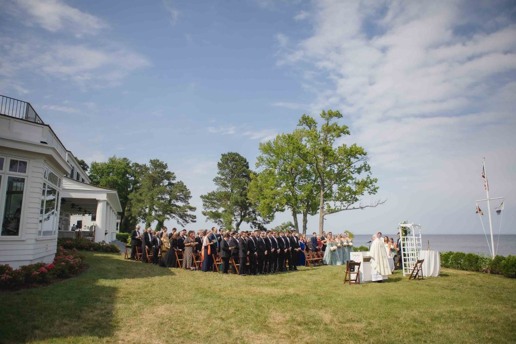 A wedding ceremony with an ocean view.