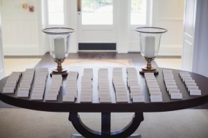 A wedding table with place cards on it, showcasing intricate details.