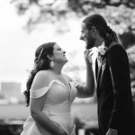 Black and white wedding portrait of bride and groom.