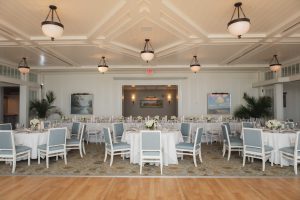 A wedding with detailed table and chair arrangements for the reception.