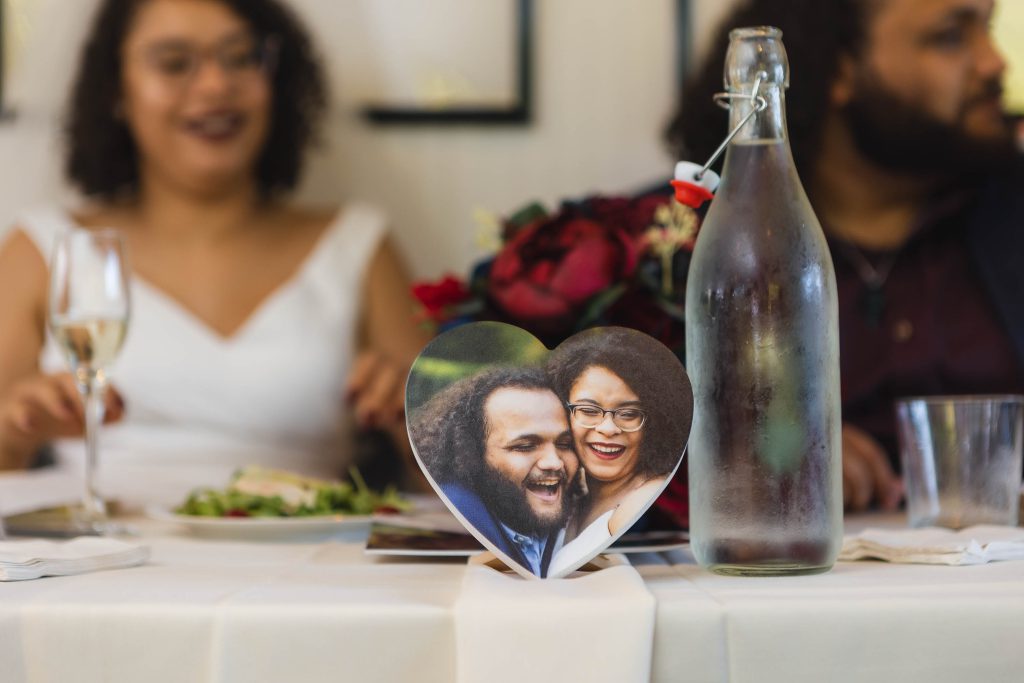 A photo of a couple at their wedding reception.
