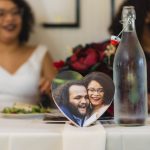 A photo of a couple at their wedding reception.