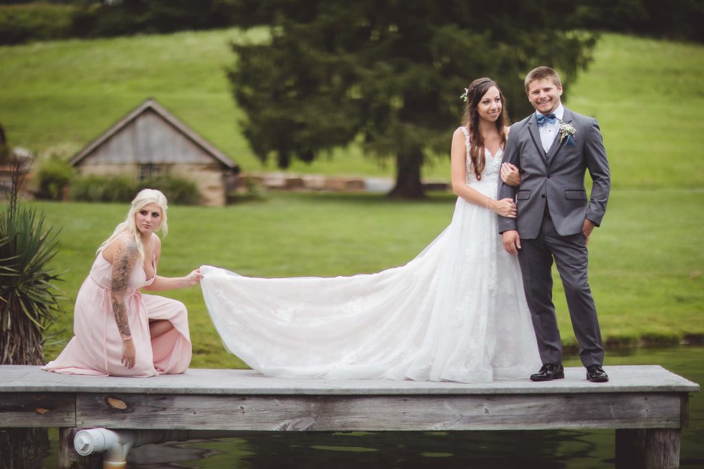A wedding portrait on a dock.