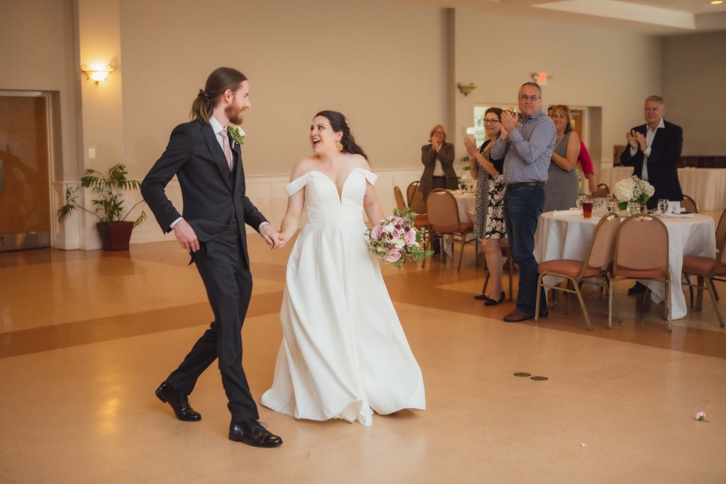 A couple's first dance at their wedding reception.