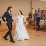 A couple's first dance at their wedding reception.