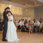 A couple's first dance at their wedding reception.