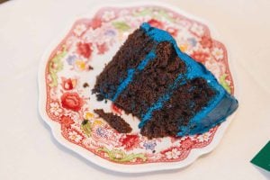 A detailed chocolate cake displayed on a plate.