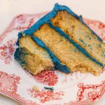 A wedding cake on a plate.