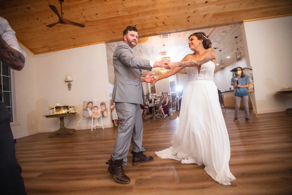 A couple dancing at their wedding reception.
