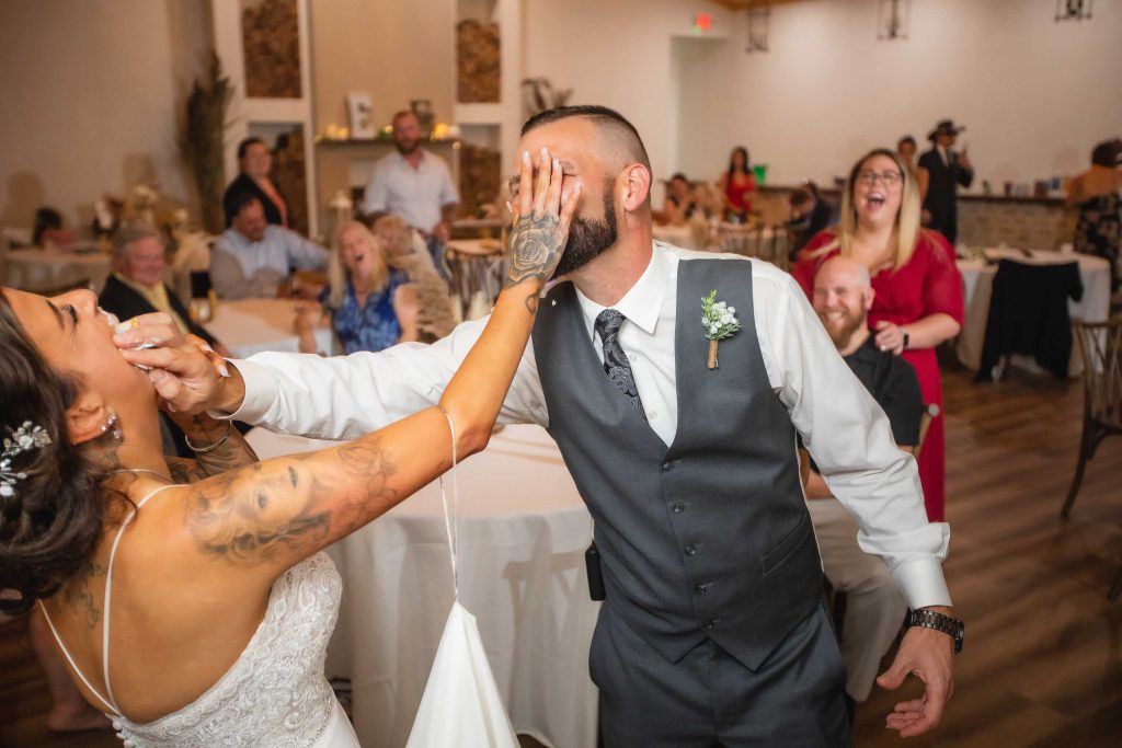 A couple sharing their first dance at their wedding reception.