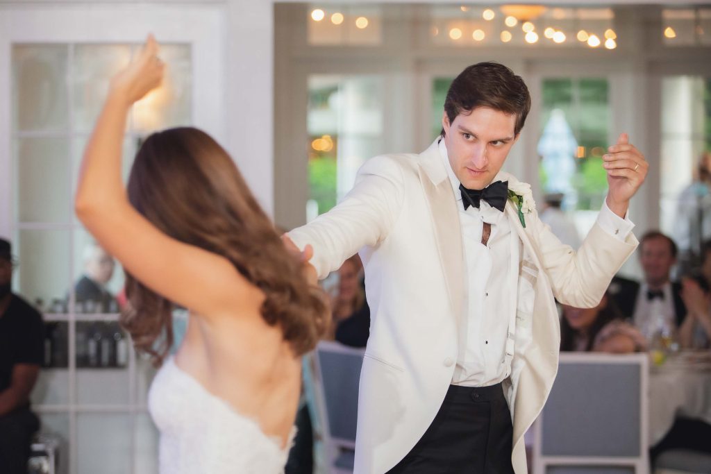 A couple dancing at their wedding reception.