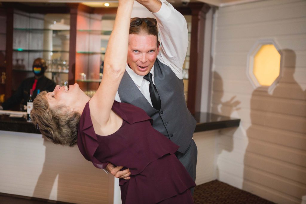 A couple dancing at a wedding reception.