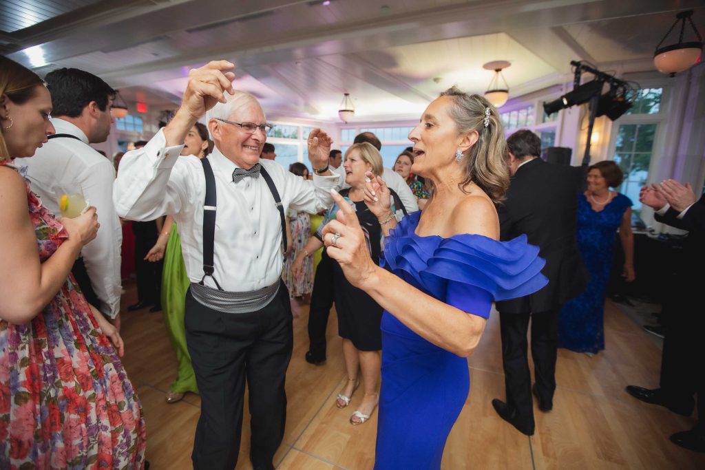 A couple dancing at a wedding reception.