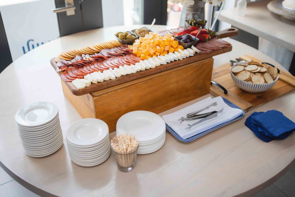 A festive platter of food on a table at a birthday party.