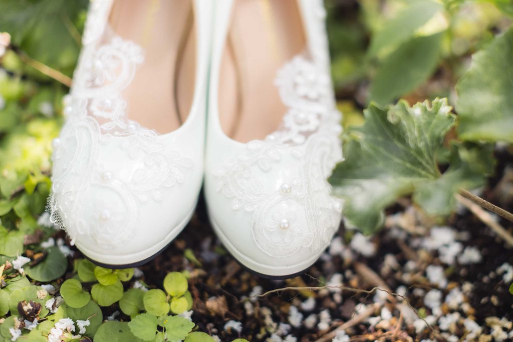 Wedding shoes with lace details.