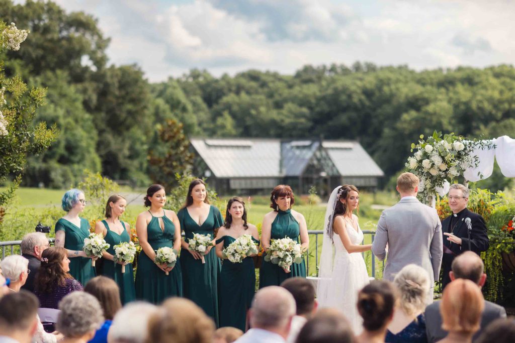 A wedding ceremony with bridesmaids.