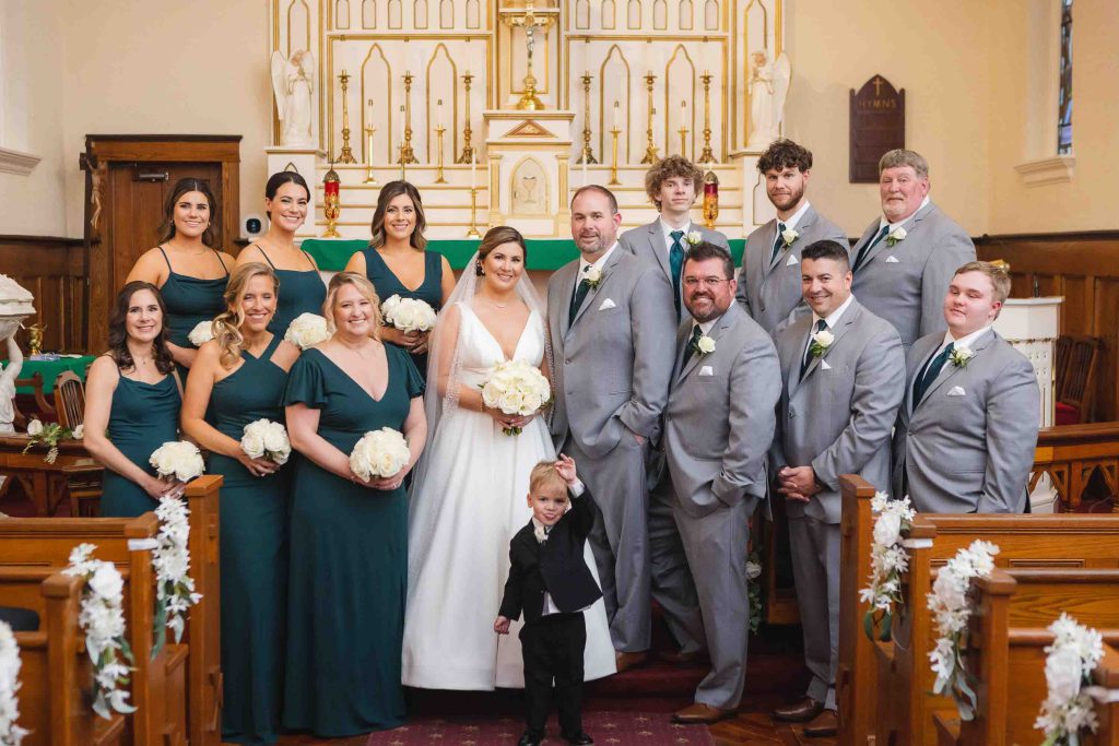 A wedding party portrait in a church.