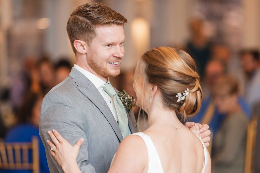 A couple's first dance at their wedding reception.