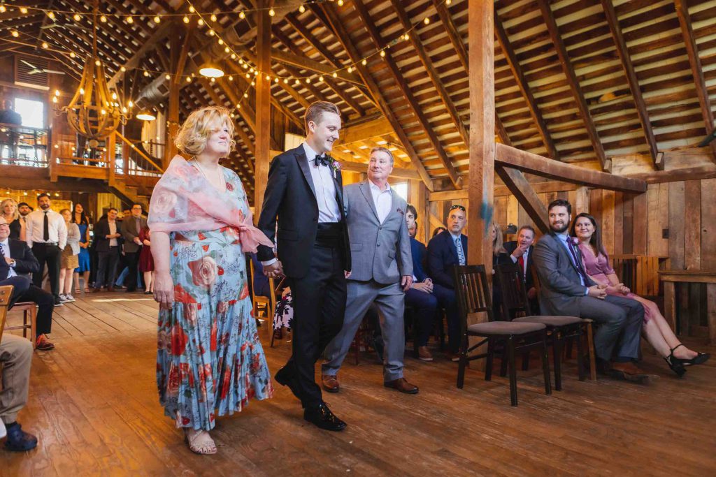 A wedding ceremony in a barn.