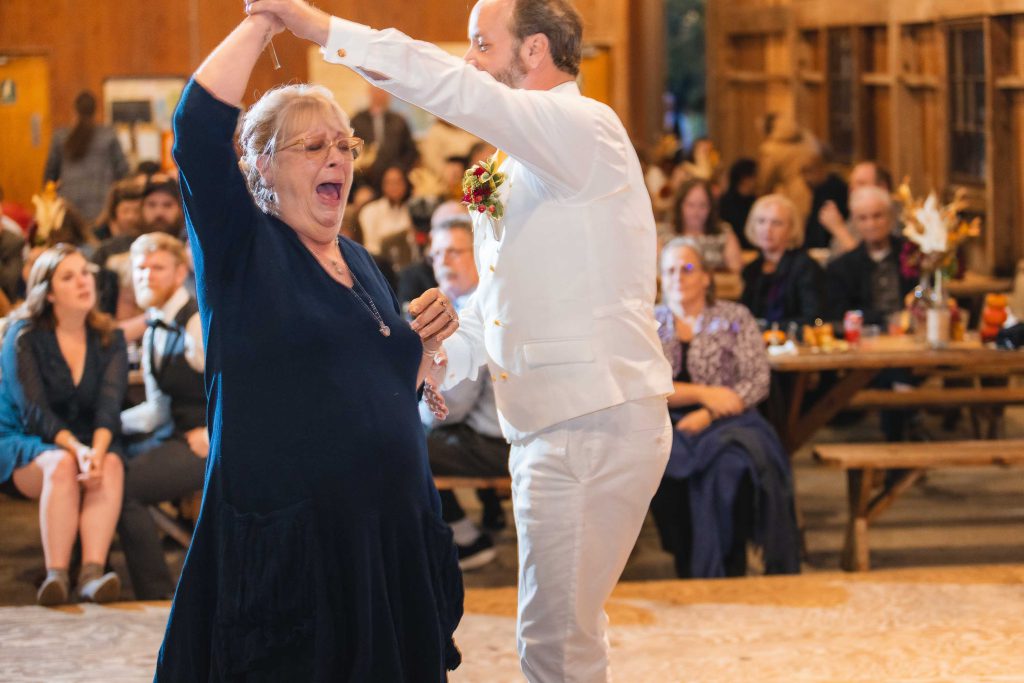 A couple dancing at a wedding reception.