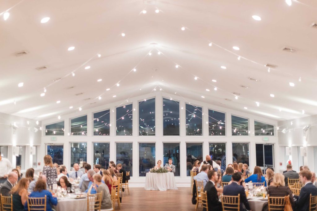 A wedding reception in a spacious room.