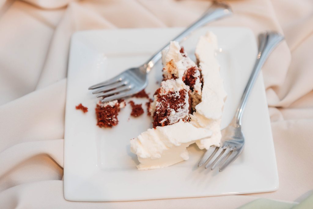 A wedding cake with intricate details.