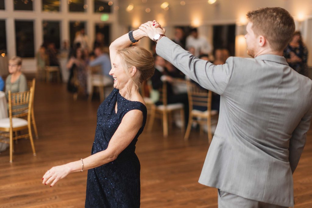 A couple dancing at a wedding reception.