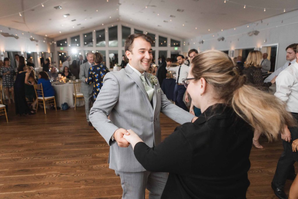 A couple dancing at a wedding reception.
