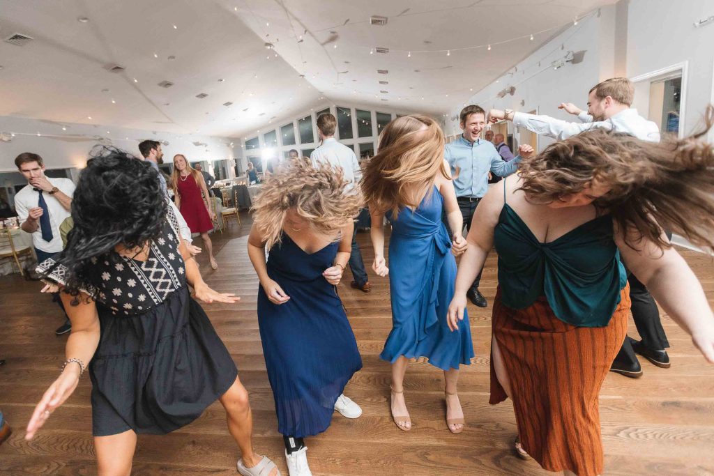 A wedding reception with dancing.