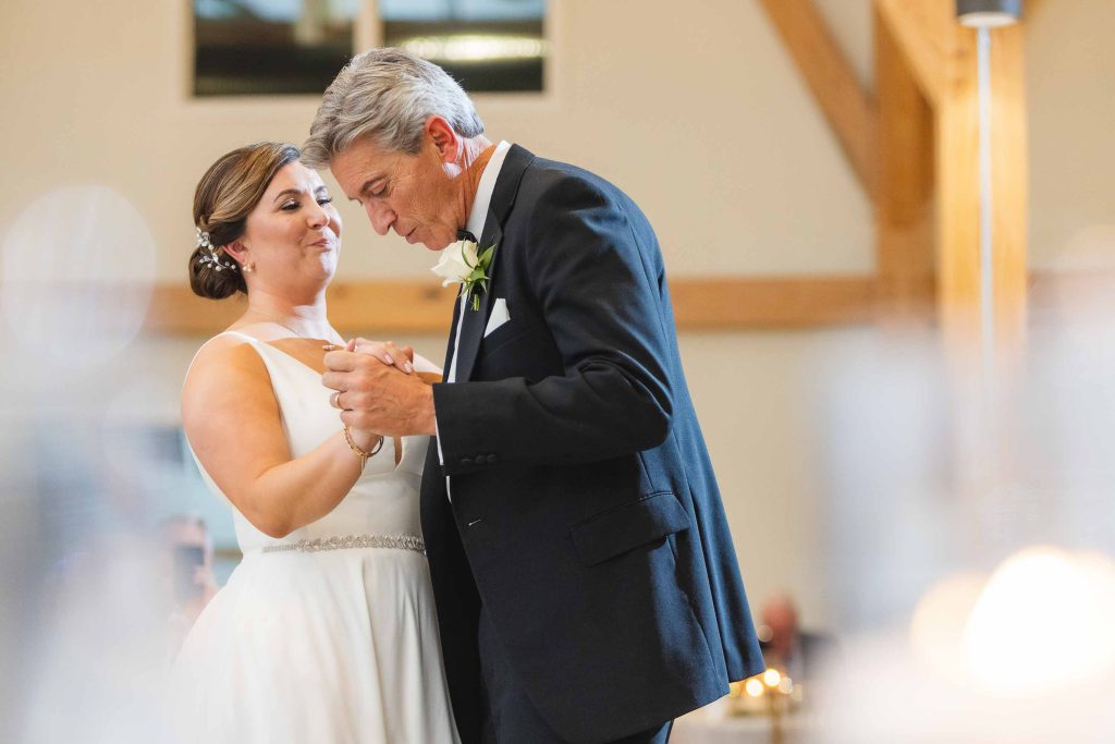 A couple's first dance at their wedding reception.