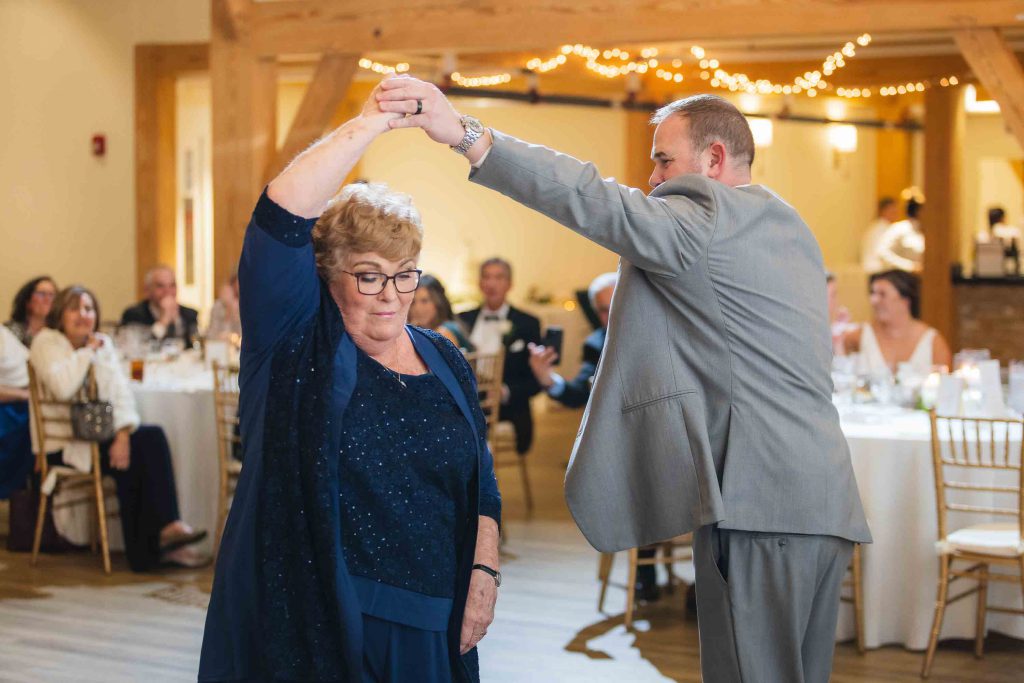 A couple dancing at a wedding reception.