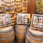 Three wine barrels decorated for a quinceañera.