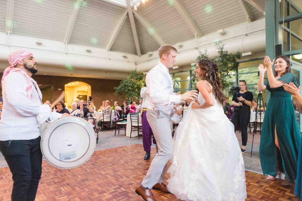 A couple dancing at a wedding reception.