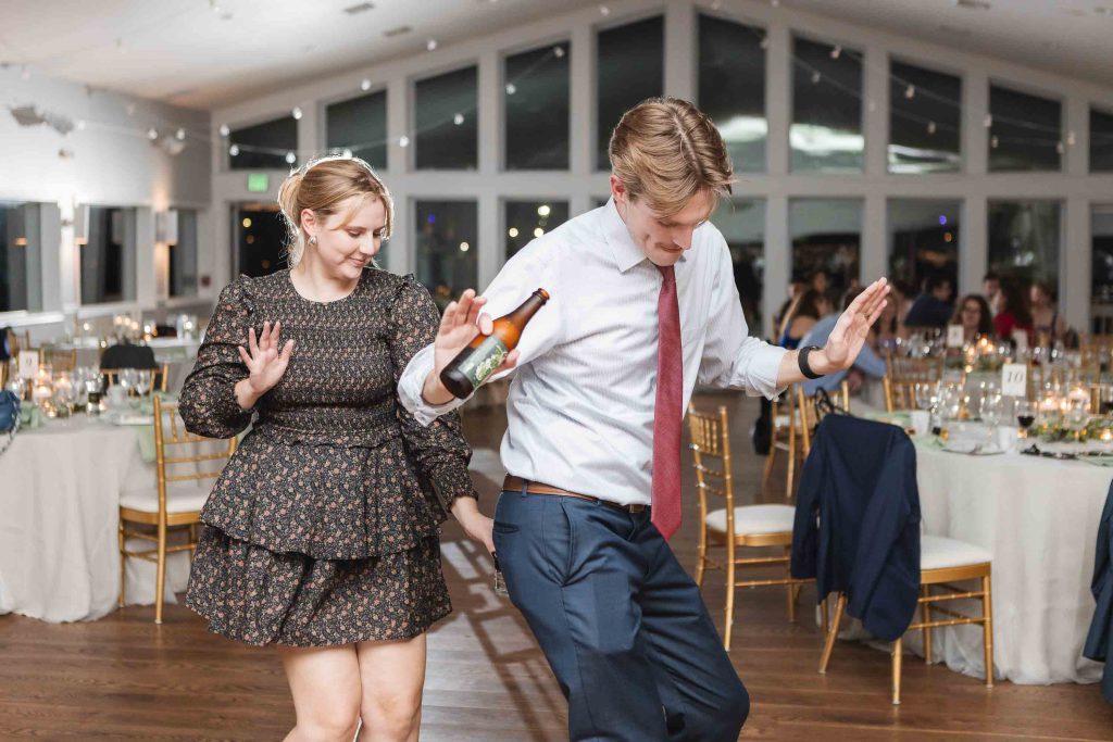 A couple dancing at a wedding reception.