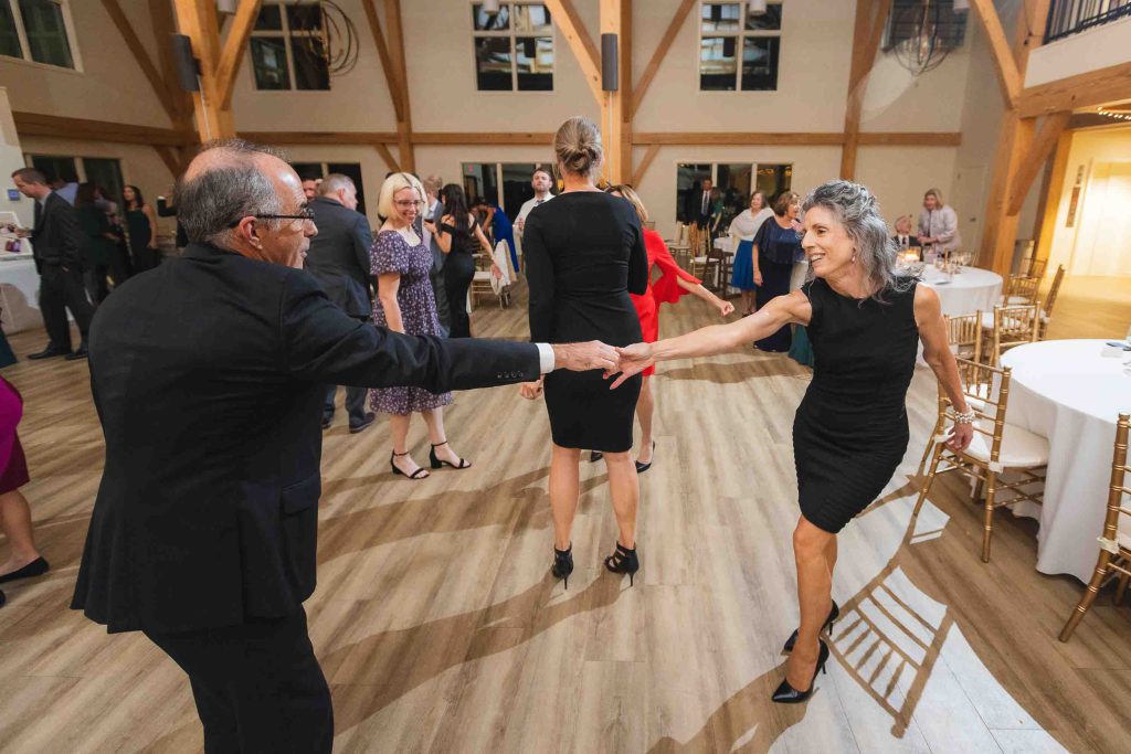 A couple dancing at a wedding reception.