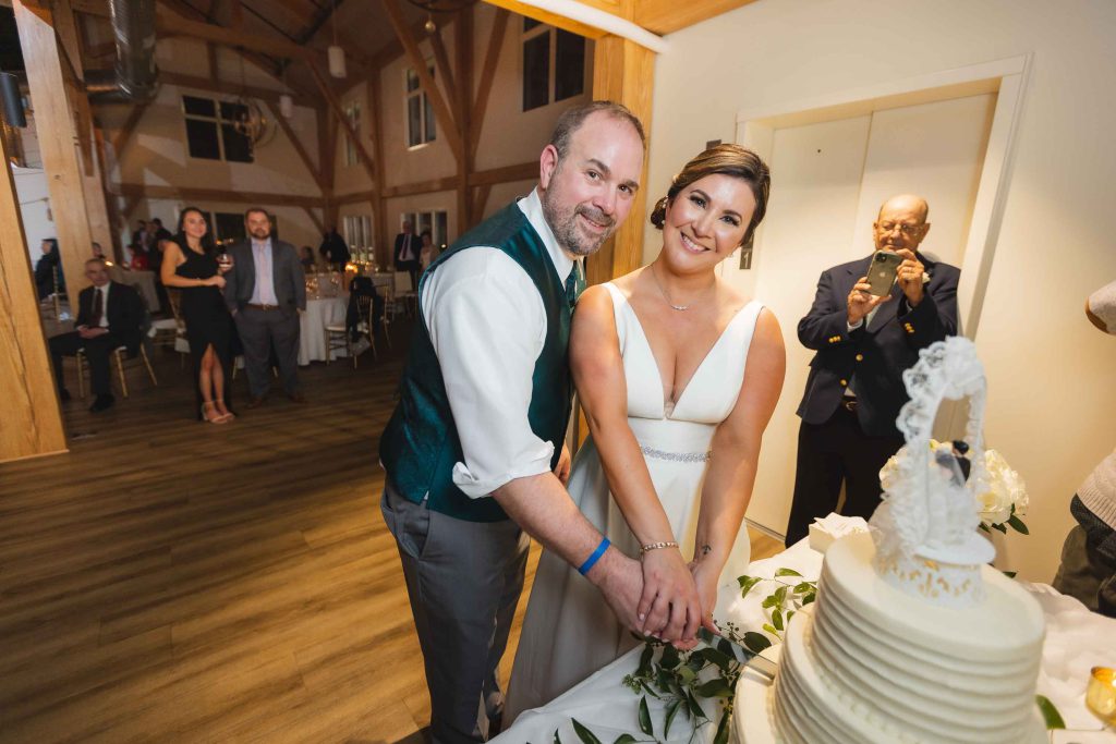 A bride and groom celebrating their wedding reception.