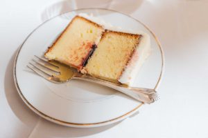 A slice of cake on a plate.