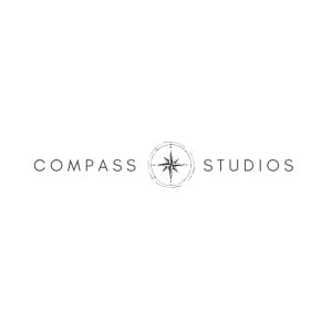 Compass Studios logo on a white background.