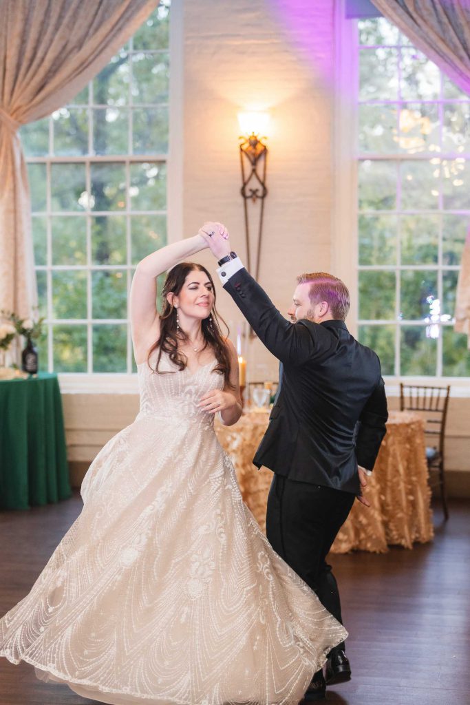 A Savage Mill bride and groom dancing at their wedding reception.
