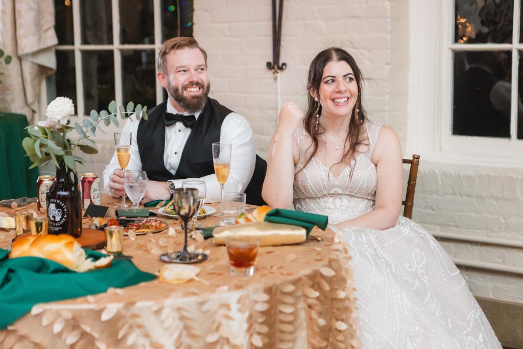 A bride and groom enjoying their wedding reception at Savage Mill.