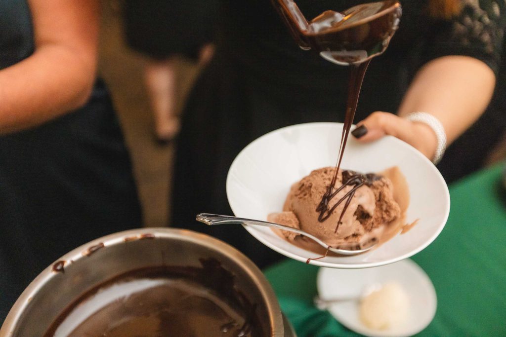 Chocolate ice cream being poured into a bowl at Savage Mill.