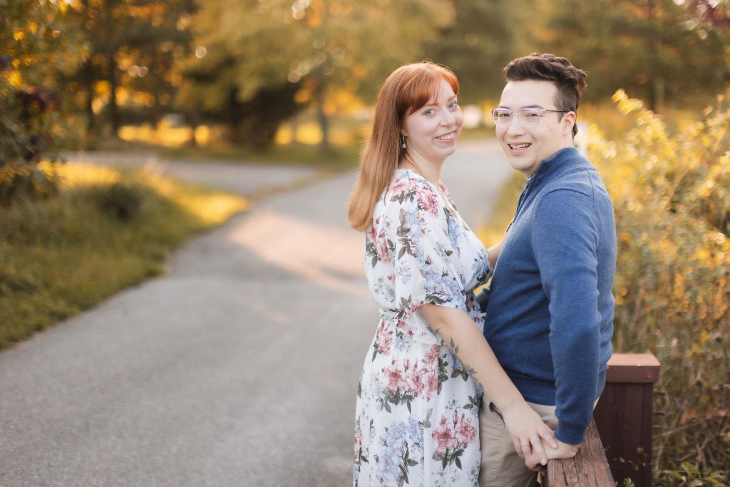 A couple posing for engagement portraits in Patuxent Research Refuge.