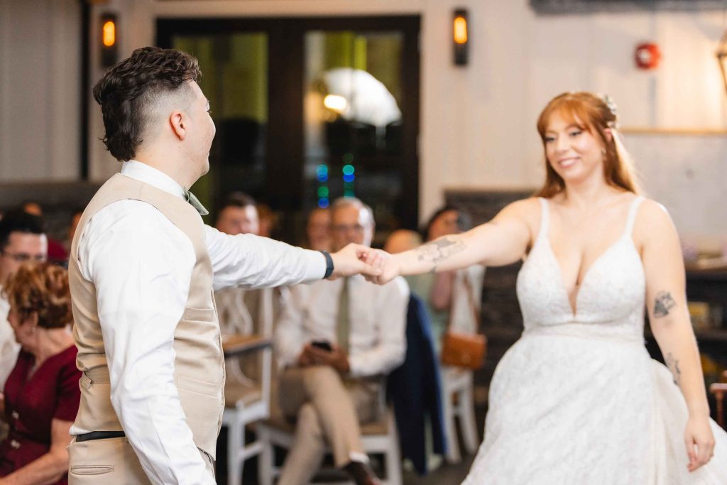 A bride and groom dancing at a Wedding Reception at the Blackwall Barn & Lodge.
