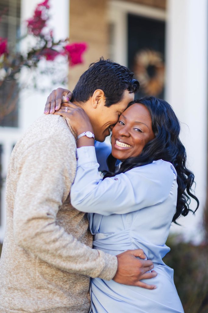 A Family embracing at Home.