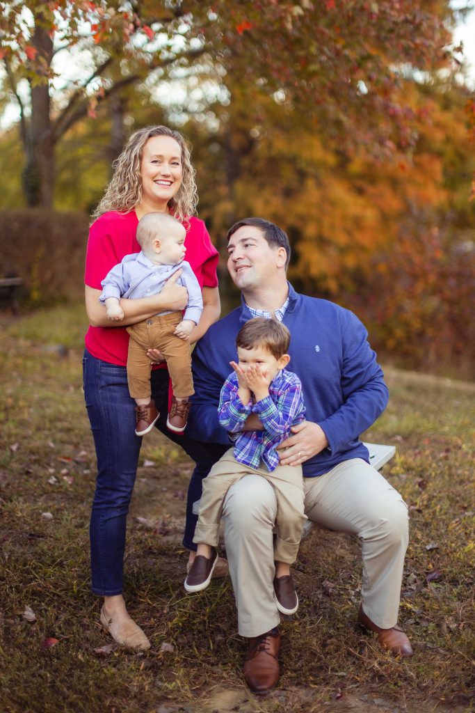 A family is posing for a photo in Quiet Waters Park in Annapolis, Maryland.