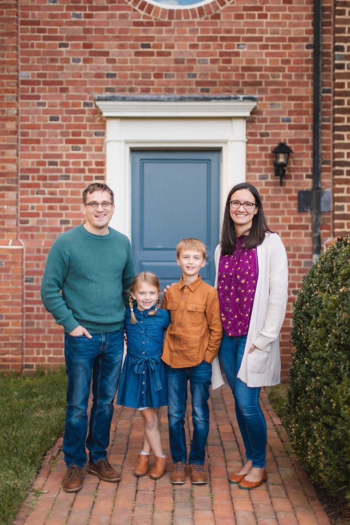 A Family poses for Portraits in front of their Belair Mansion.